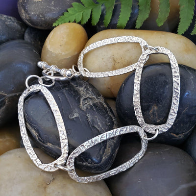 Hammered silver open link bracelet