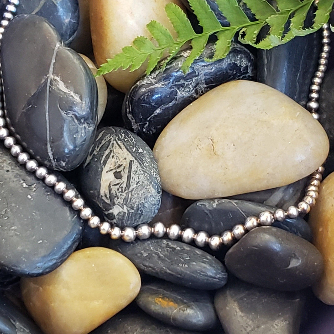 Graduated silver bead necklace