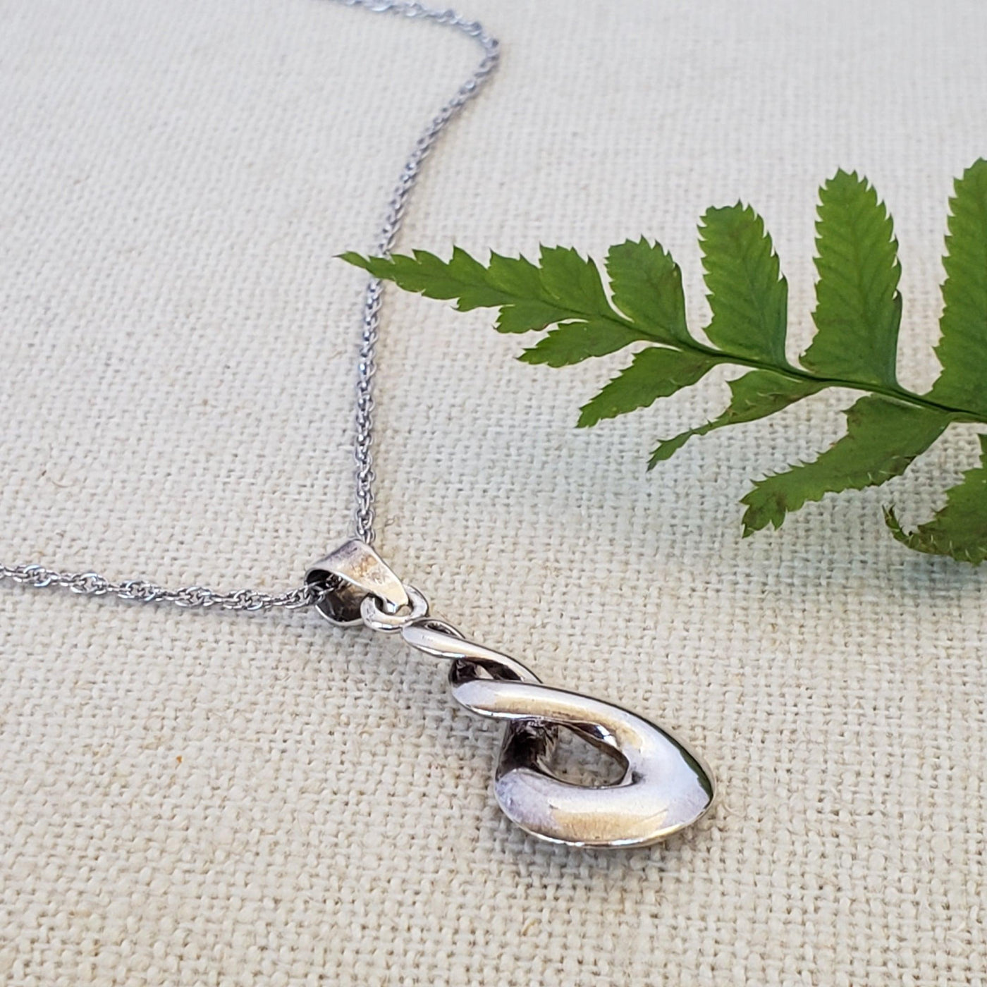 Infinity symbol pendant