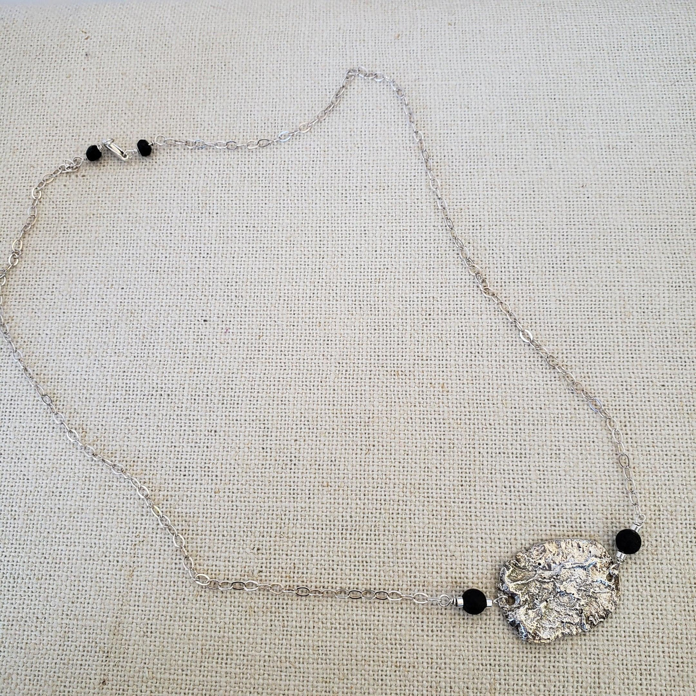 Reticulated silver necklace