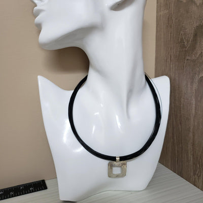 Silver hammered pendant on a multi strand black cord - LB Designs